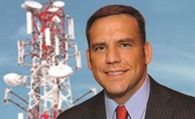 Photo of Steve Mudder with tower in background