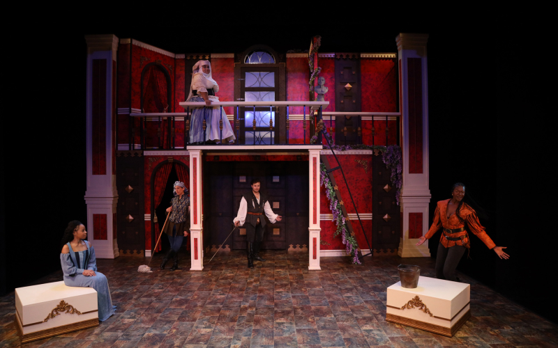Image of actors on a stage performing Romeo and Juliet