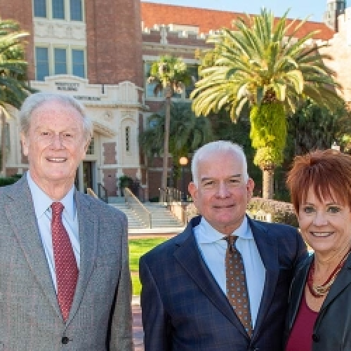 President Thrasher next to Gail and Bob Knight